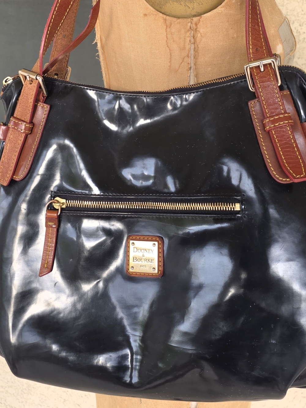Dooney & Bourke Black Patent Leather Shoulder Bag with Brown Trim